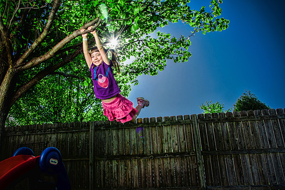 Abby in the backyard swinging on the tree.April 23, 2017
